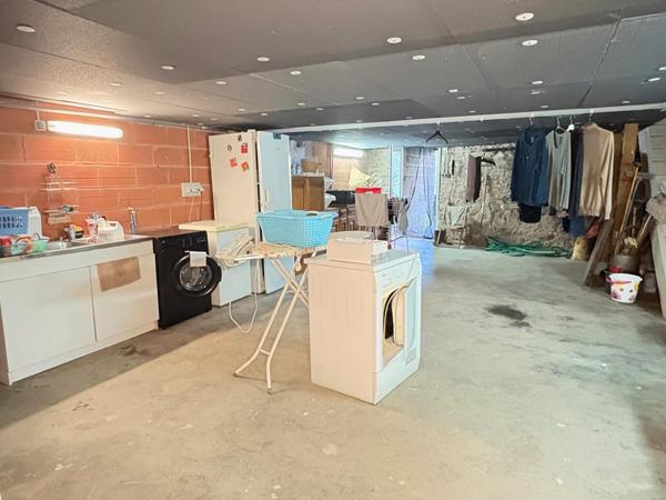 Maison chaleureuse avec garage cave et jardin