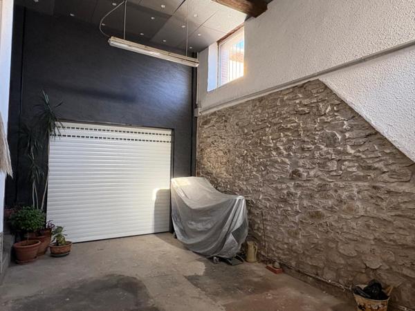 Maison chaleureuse avec garage cave et jardin