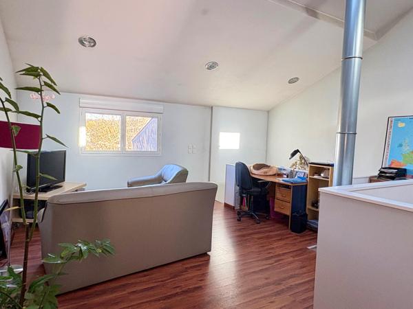 Maison chaleureuse avec garage cave et jardin