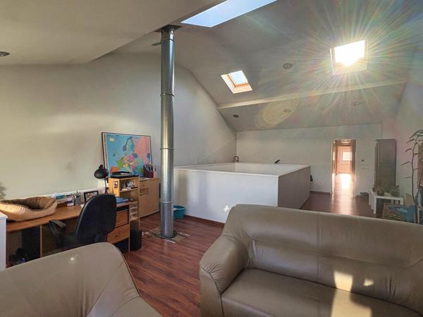 Maison chaleureuse avec garage cave et jardin