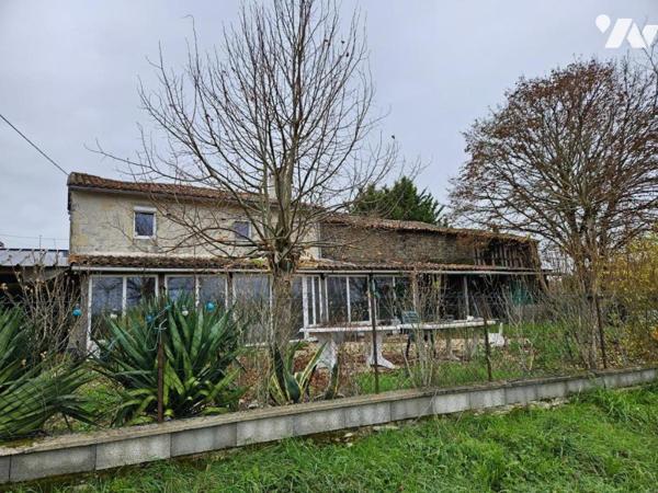 A vendre à CHAUNAY, une maison ancienne au sein d'un terrain de 6123m²