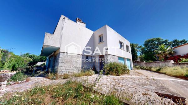 Castelnau le Lez, maison 160 M2 garages et atelier