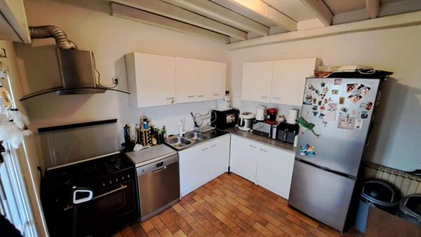 Maison mitoyenne - terrain - dépendance