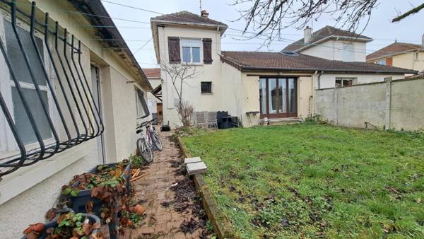 Maison mitoyenne - terrain - dépendance