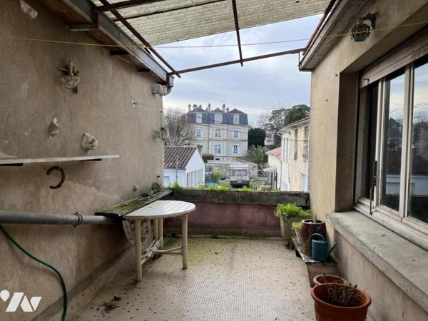 Local commercial et appartement T5 centre-ville