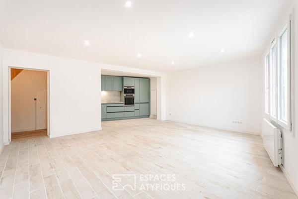 Maison de village et sa terrasse sur le toit