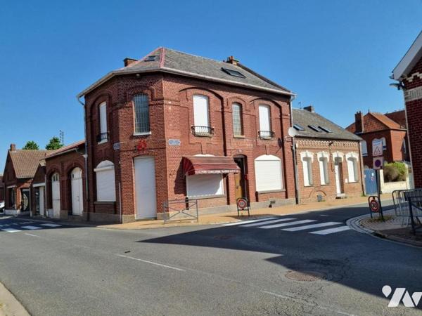 Ensemble immobilier à fort potentiel : Commerce, Habitation ou Division d'immeuble avec garage