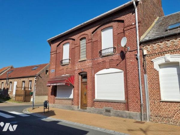 Ensemble immobilier à fort potentiel : Commerce, Habitation ou Division d'immeuble avec garage