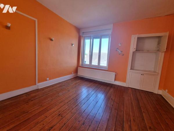 Ensemble immobilier à fort potentiel : Commerce, Habitation ou Division d'immeuble avec garage
