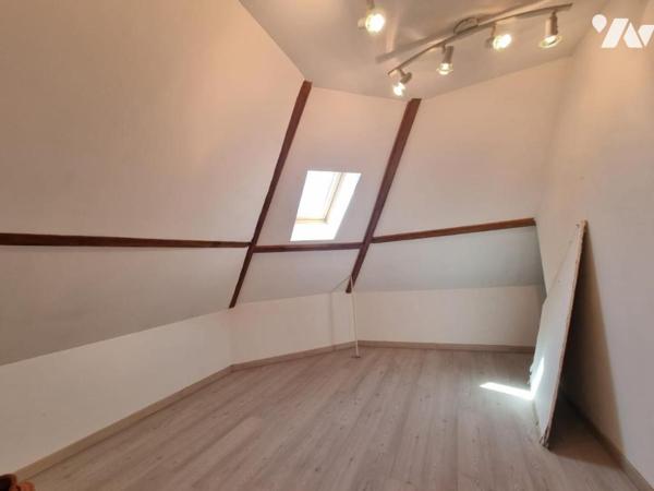 Ensemble immobilier à fort potentiel : Commerce, Habitation ou Division d'immeuble avec garage