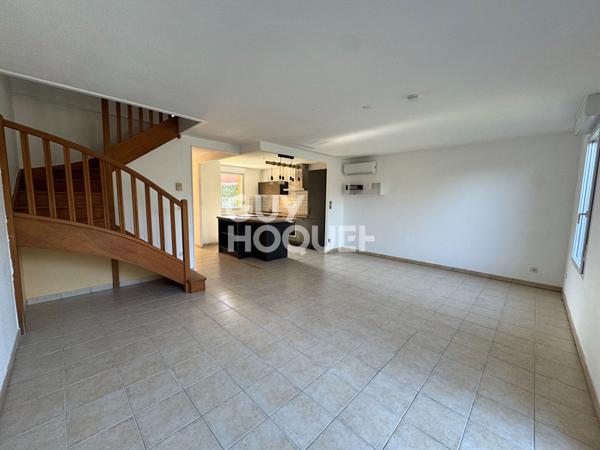 Villa T4 avec jardin et garage.