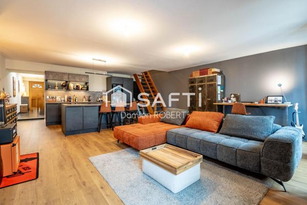 GRANDE APPARTEMENT AU CENTRE DU VILLAGE