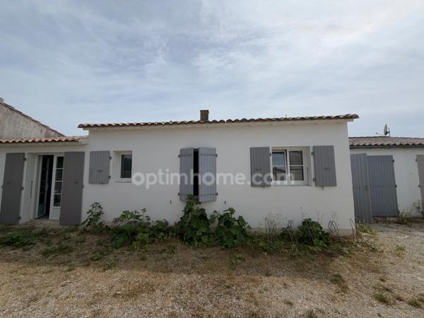 CHARMANTE MAISON RÉTAISE AVEC JARDIN CLOS ET TERRASSE ET  GARAGE AU CŒUR DE LOIX