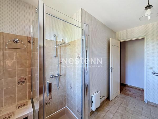 À vendre maison à Auch, calme, jardin, terrasse,  garage et véranda.