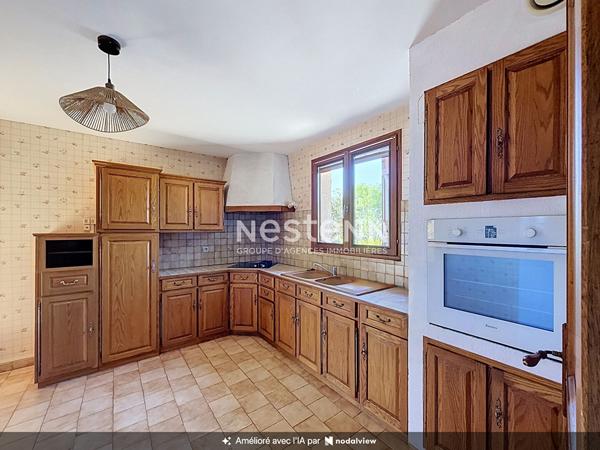 À vendre maison à Auch, calme, jardin, terrasse,  garage et véranda.