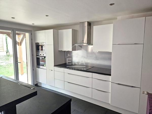 Grande maison familiale 8 pièces avec jardin et garage, proche centre et gare