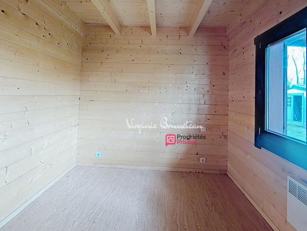 Maison en bois 3 pièces Terrain arboré et clôturé