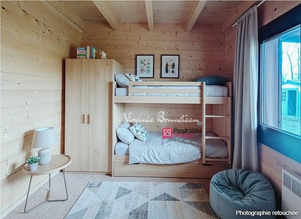 Maison en bois 3 pièces Terrain arboré et clôturé