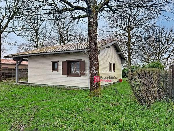Maison en bois 3 pièces Terrain arboré et clôturé