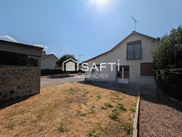 ENSEMBLE DE 2 HABITATIONS AVEC GARAGES ET JARDIN