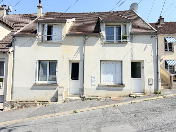 Immeuble comprenant trois logements.