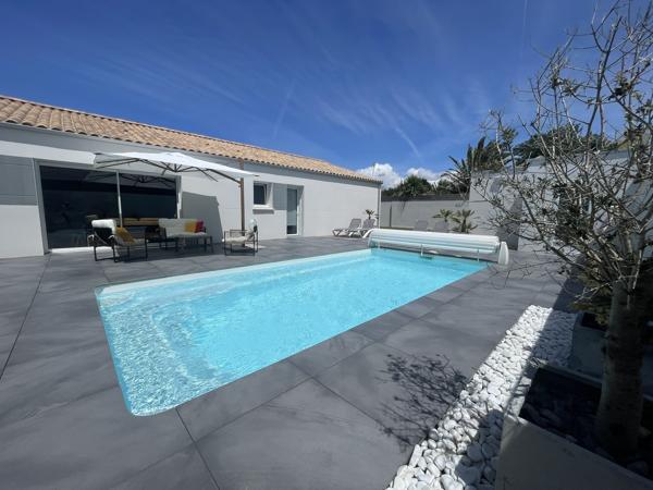 Véritable plain-pied 4 chambres contemporaine Toutes les caractéristiques