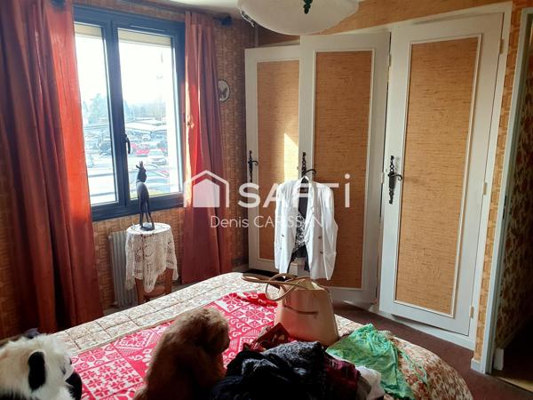 Maison 93M² 4 pièces, avec jardin et garage, proche centre ville.