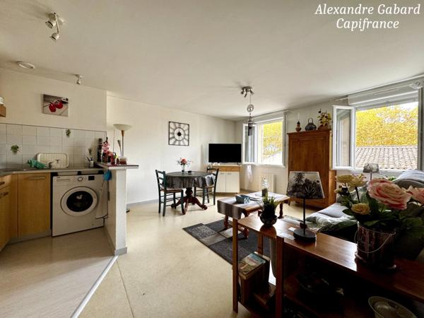 LANGON CENTRE VILLE - Immeuble en pierres 450 m² comprenant 6 appartements et 2 locaux commerciaux