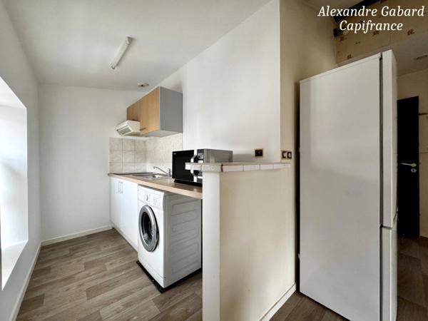 LANGON CENTRE VILLE - Immeuble en pierres 450 m² comprenant 6 appartements et 2 locaux commerciaux