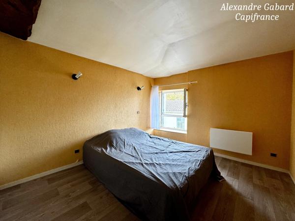 LANGON CENTRE VILLE - Immeuble en pierres 450 m² comprenant 6 appartements et 2 locaux commerciaux