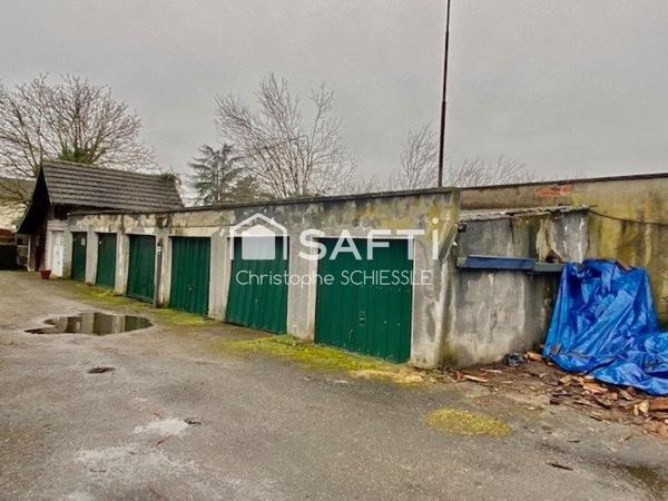 Immeuble de 4 Appartements, avec lot de 7 garages