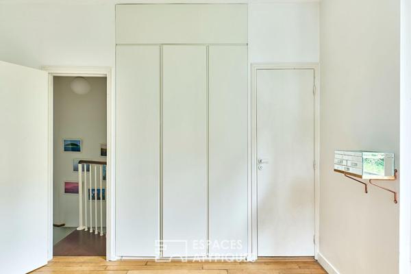 Duplex sur cour avec son jardin arboré