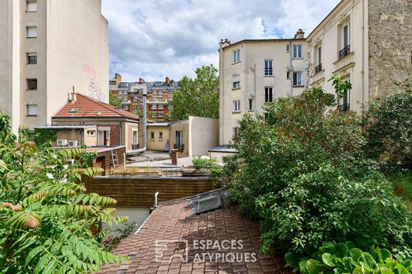 Duplex sur cour avec son jardin arboré