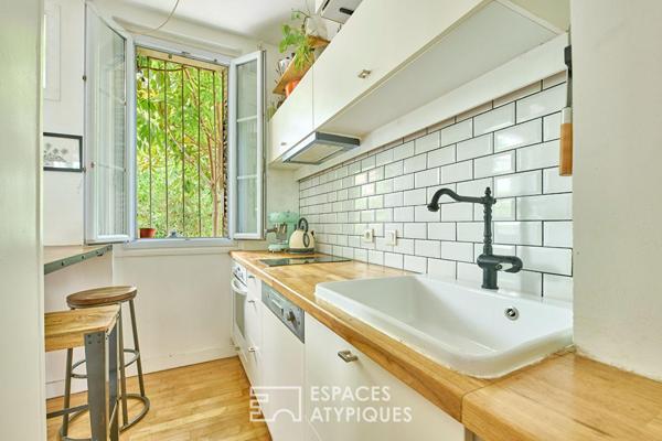 Duplex sur cour avec son jardin arboré