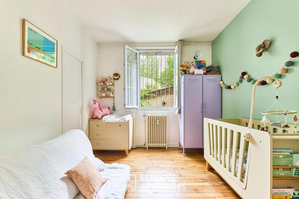Duplex sur cour avec son jardin arboré