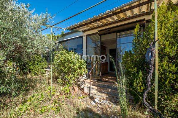 Maison plein pied+ terrain.
