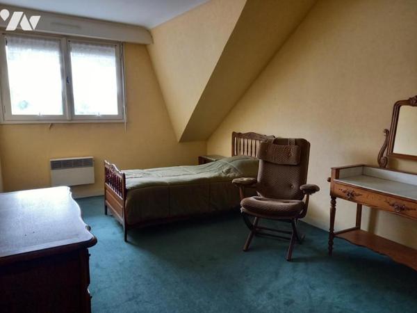 Maison familiale à fort potentiel – 1 105 m² de terrain