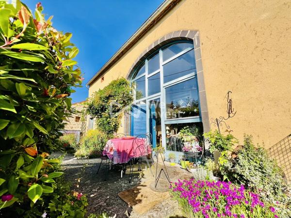 Propriété de 243 m² habitables, avec garage, terrain