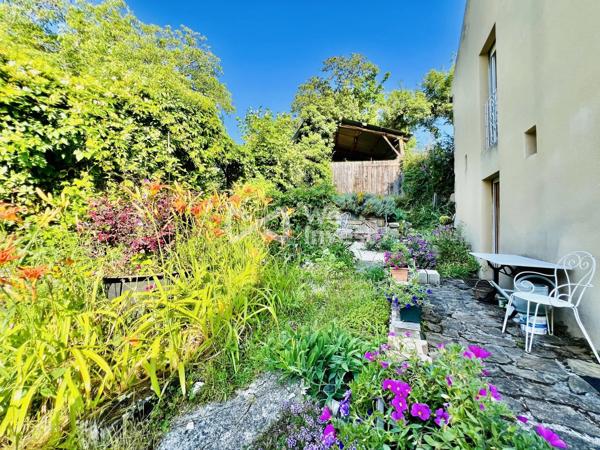 Propriété de 243 m² habitables, avec garage, terrain