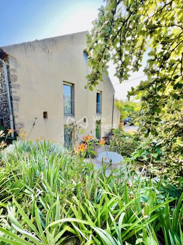 Propriété de 243 m² habitables, avec garage, terrain