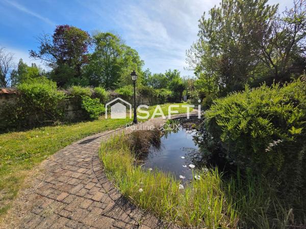 maison 6 pièces avec 2 garages et un jardin clos