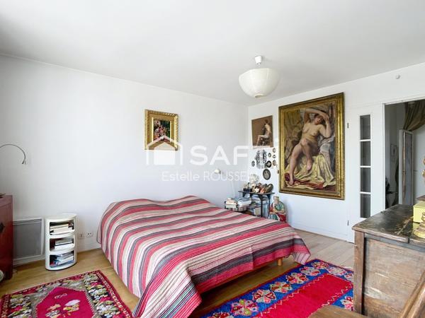 T2 vue sur Seine proche commerces et transports