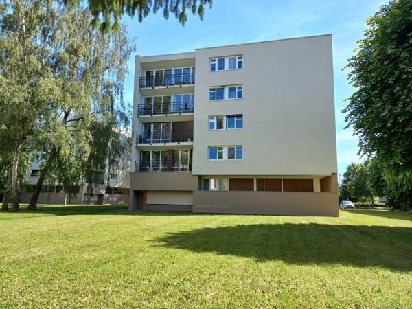 Appartement dans un écrin de verdure.
