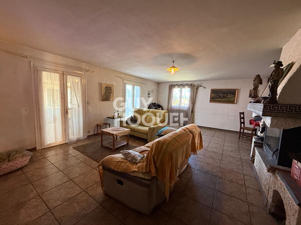 À vendre : Appartement spacieux en RDJ avec piscine et garage à Cabestany.