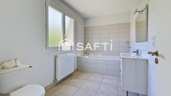 Maison T6 125m² avec garages et jardin de 2200m².