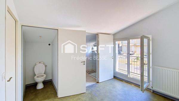 Maison T6 125m² avec garages et jardin de 2200m².