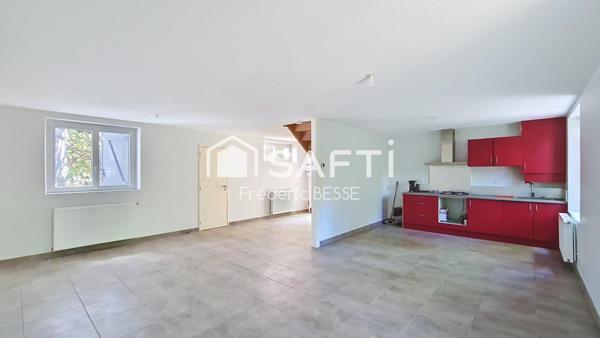 Maison T6 125m² avec garages et jardin de 2200m².