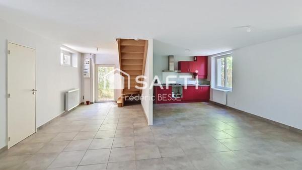Maison T6 125m² avec garages et jardin de 2200m².
