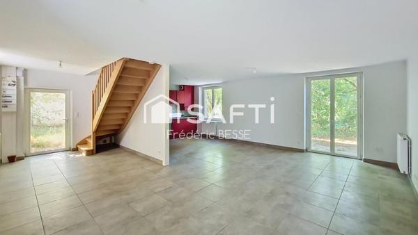 Maison T6 125m² avec garages et jardin de 2200m².