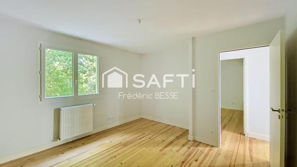 Maison T6 125m² avec garages et jardin de 2200m².